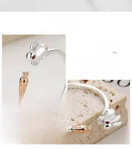 Detailed close-up of S925 silver rabbit and carrot open ring with polished finish