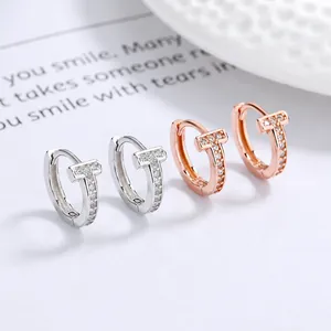 Pendientes de aro en forma de T de plata 925 con circonitas en plata y oro rosa