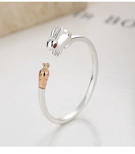 Close-up of S925 silver ring featuring a cute rabbit and rose gold carrot detail