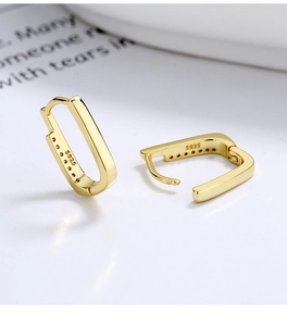 Close-up of gold-plated 925 silver rectangular hoop earrings with S925 hallmark engraving