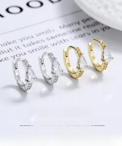 Detailed view of S925 sterling silver hoop earrings with pear-cut crystals in gold and silver
