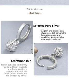 Vue détaillée des créoles en argent sterling S925 avec breloques sphériques en zircon brillant