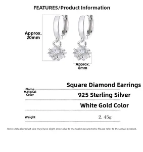 Détail de boucles d'oreilles créoles en argent 925 avec zircons carrés de 6 mm