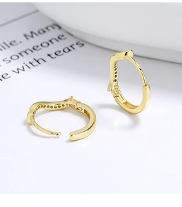 Close-up of S925 sterling silver gold-plated cat-ear hoop earrings with tiny zircon stones