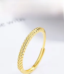 Macro shot of S925 sterling silver wheat-textured open ring with multi-layer gold plating