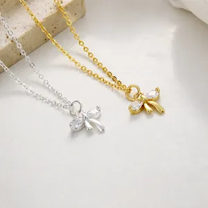 Collier nœud papillon en argent 925 avec pendentifs en zircon en finitions argent et or
