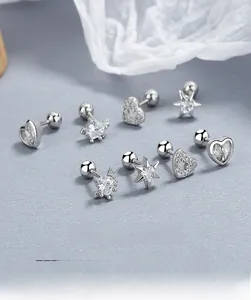 Close-up of S925 sterling silver stud earrings set featuring heart and star shapes
