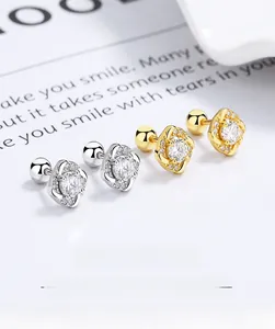 Macro shot of 925 silver square zircon stud earrings with screw back and sparkling diamonds