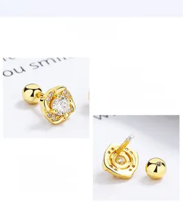 Detail view of S925 sterling silver clover earrings with sparkling zircon and screw back