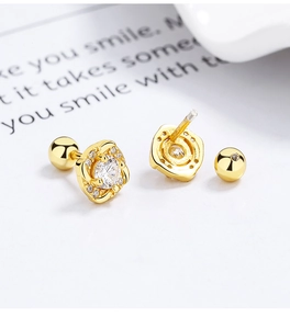 Macro detail of 925 silver square zircon stud earrings with screw back closure