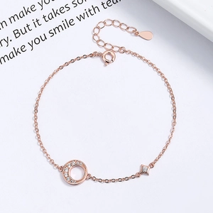 Bracelet en argent 925 avec étoile et croissant de lune dorés à l'or rose et zircons