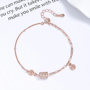 Bracelet élégant en argent 925 or rose avec cylindre scintillant et breloques pièces