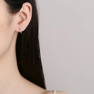 Elegant 925 silver gold snake stud earrings with zircon stones for a minimalist look