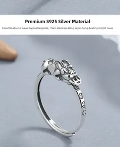 Detailed macro view of S925 sterling silver PiXiu ring with ancient coin engravings