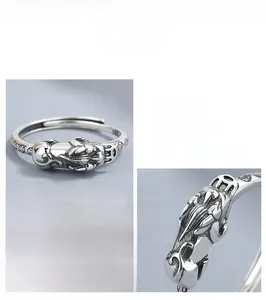 Macro detail of S925 sterling silver PiXiu ring showing intricate vintage engraving