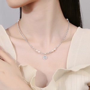 925 Sterling Silver necklace for women featuring pearls and a heart embossed round pendant