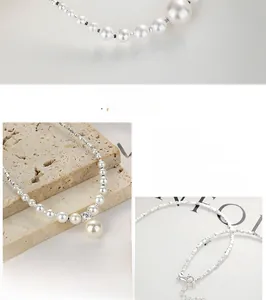 Close-up of 925 sterling silver chain with large round pearl and sparkling zircon stone