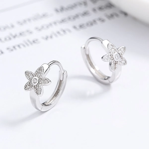 Sparkling S925 sterling silver five-petal flower hoop earrings with zircon pavé details
