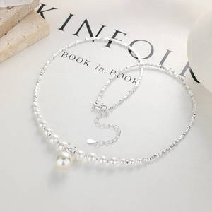 Elegant 925 sterling silver necklace with a lustrous white pearl pendant and zircon stone