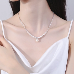 Elegant 925 sterling silver smile necklace featuring white pearls and a brilliant zircon pendant
