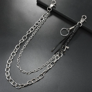 Detail of silver multi-layer metal pants chain with black woven tassel and lobster clasps