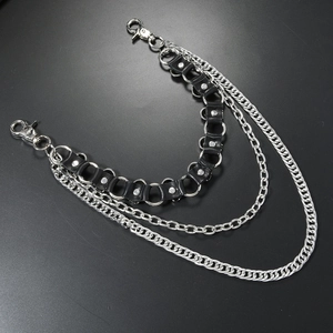 Punk multilayer trouser chain with black PU leather, metal studs, and skull accents