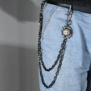 Punk multi-layer metal pants chain with spike cross pendant on light blue denim jeans