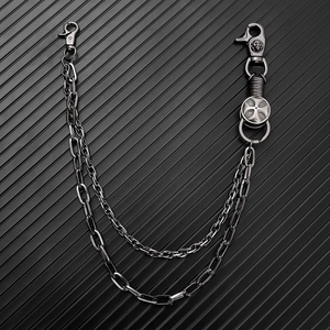 Close-up of double-layer punk pants chain with skull lobster clasp and cross pendant
