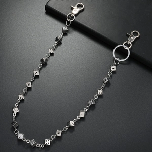 Punk style silver metal wallet chain featuring hanging dice charms and lobster clasps