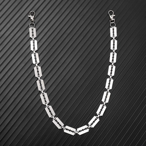 Close-up of punk style trousers chain with interlocking metal blades and lobster clasps