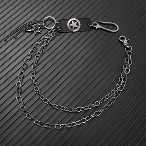 Close-up of double-layer metal wallet chain with star pendant and industrial lobster clasp