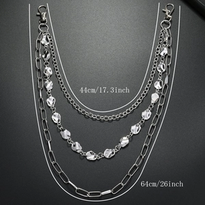 Detailed view of layered silver punk trouser chains with 44cm and 64cm length labels