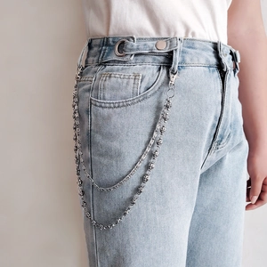 Punk silver double-layered pants chain with embossed cross beads on blue denim jeans