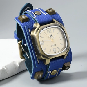 Detail of blue leather strap with white stitching and bronze rivets on punk watch