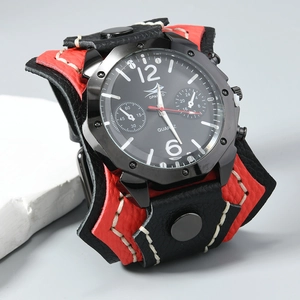 Macro view of wide black and red leather punk watch strap with thick contrast stitching