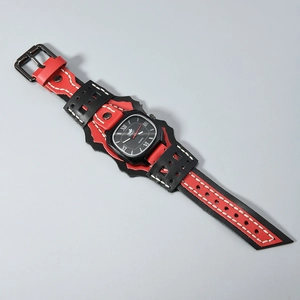 Detail of wide punk leather watch band with white stitching and metal rivets