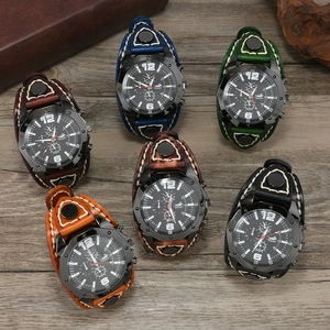 Retro handmade punk style wide leather watch straps in multiple vintage colors on wood