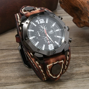 Close-up of vintage brown leather watch band with rugged white stitching and metal rivets