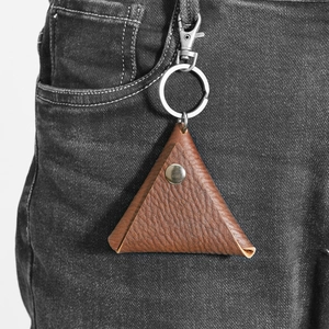 Triangle lychee grain brown leather coin purse keychain hooked on black jeans