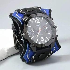 Detail view of broad black and blue leather quartz watch with punk stitching and rivets