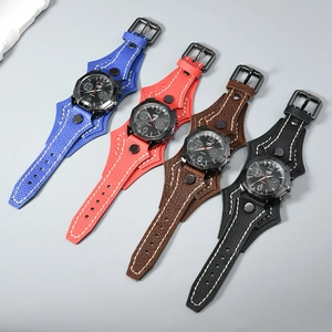 Detail of multi-layer punk leather watch bands with rivets and white stitching details