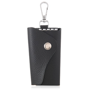 Vintage black leather key pouch with silver snap button and swivel hook on white background