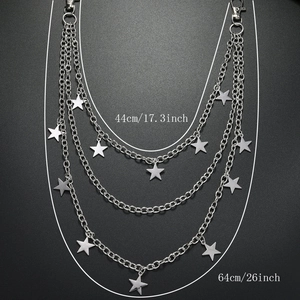 Close-up of triple-layered silver star pendant pant chain with length measurements