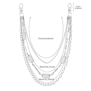 Detail view of multilayer silver waist chain with razor pendants and size labels