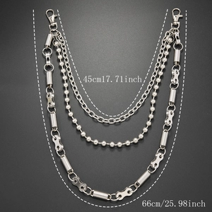 Detail of silver multi-layer punk pants chain showing ball links and spring textures