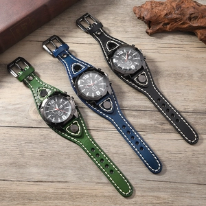 Detailed view of three vintage leather punk watches with bold stitching and metal rivets