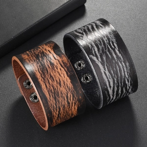 Punk vintage leather bracelet with distressed texture and adjustable silver snap buttons