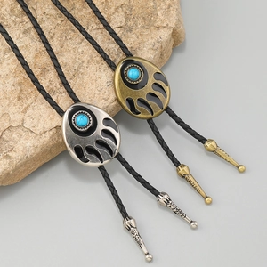 Corbatas bolo bohemias con turquesa y pata de oso en acabados de oro y plata vieja