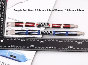 Close-up of woven leather dolphin bracelets with dimensions for couples