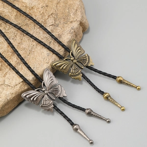 Retro butterfly bolo tie set in bronze and silver finish with braided leather rope